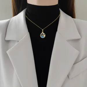 Light Luxury Star Necklace – a gold-plated titanium necklace with a celestial star and moon pendant, exuding modern elegance and cosmic charm.