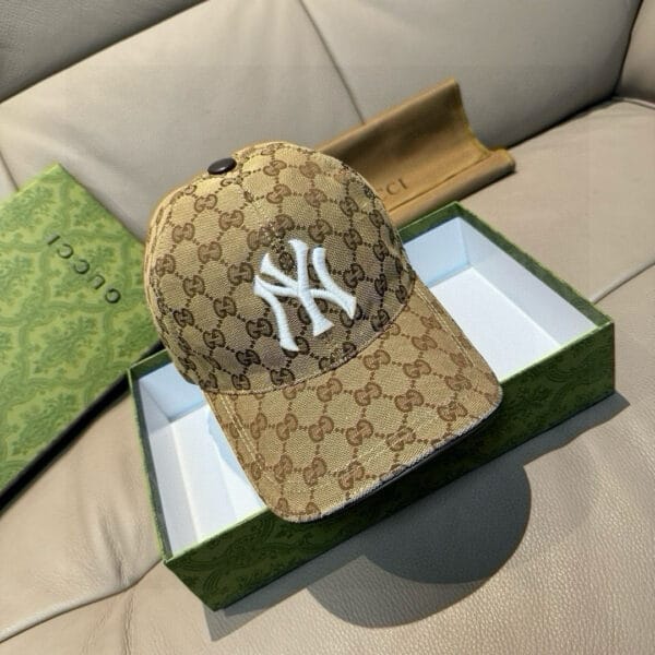 Urban Monogram Style Cap Pre-owned monogram-style baseball cap with bold front embroidery – boutique fashion clearance
