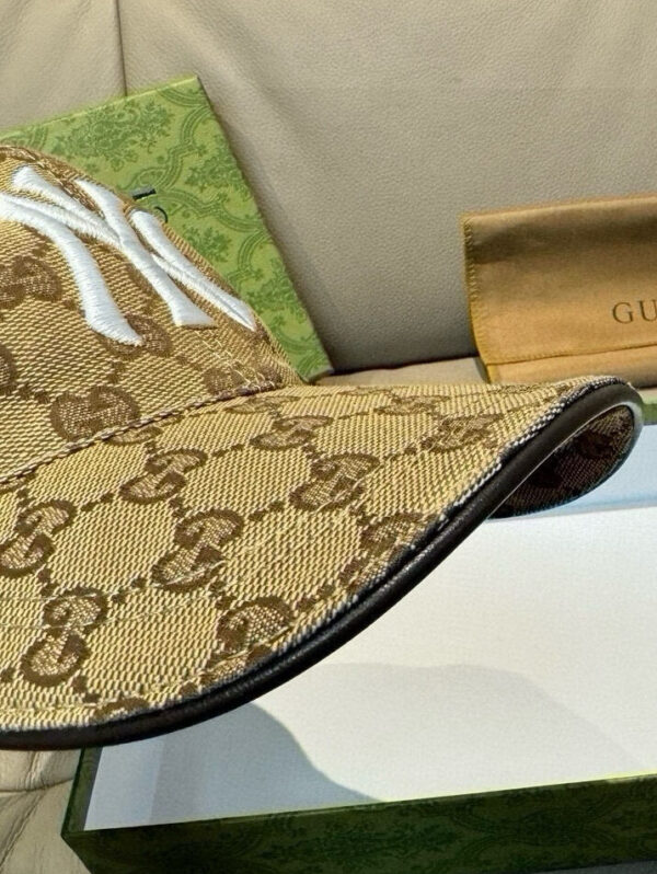 Pre-owned monogram-style baseball cap with bold front embroidery – boutique fashion clearance