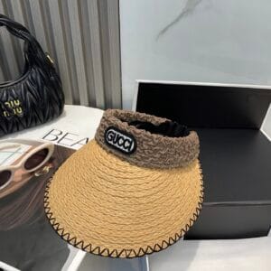 Original Gucci Straw Hat with stitched black brim and ruched brown logo band – pre-owned in excellent condition.