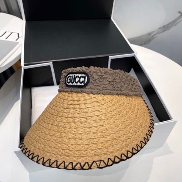 Original Gucci straw sun hat with brown ruched band and black stitched trim